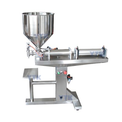 Vertical pneumatic viscous liquid filler